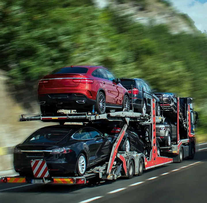 A car carrier truck with cars on it